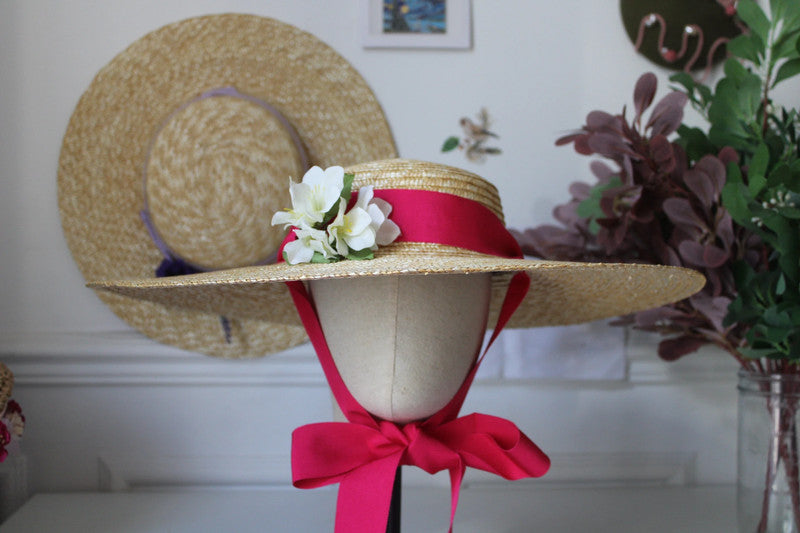 Maria straw hat with Lilium bouquet