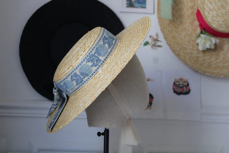 Mia Straw hat with sky blue embroidered ribbon