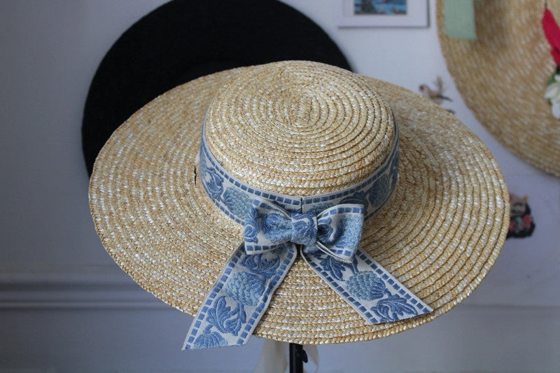 Mia Straw hat with sky blue embroidered ribbon